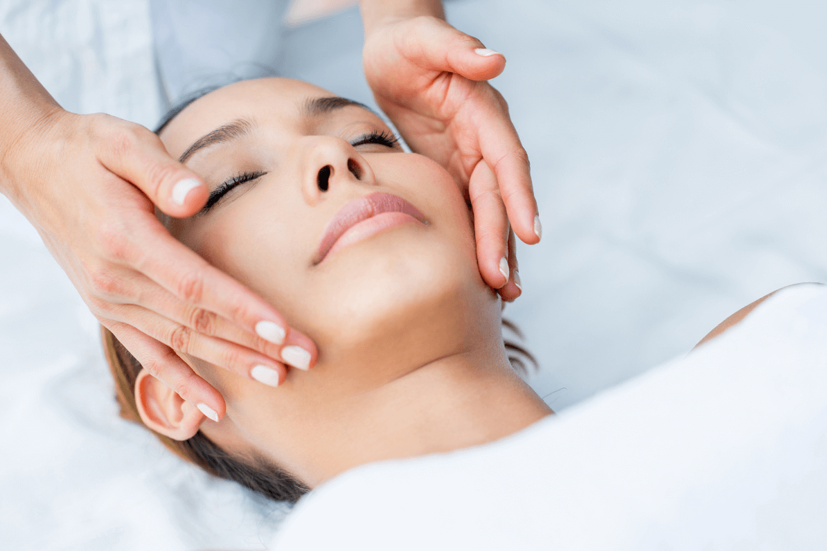 woman on her back receiving aesthetic treatment in Doncaster