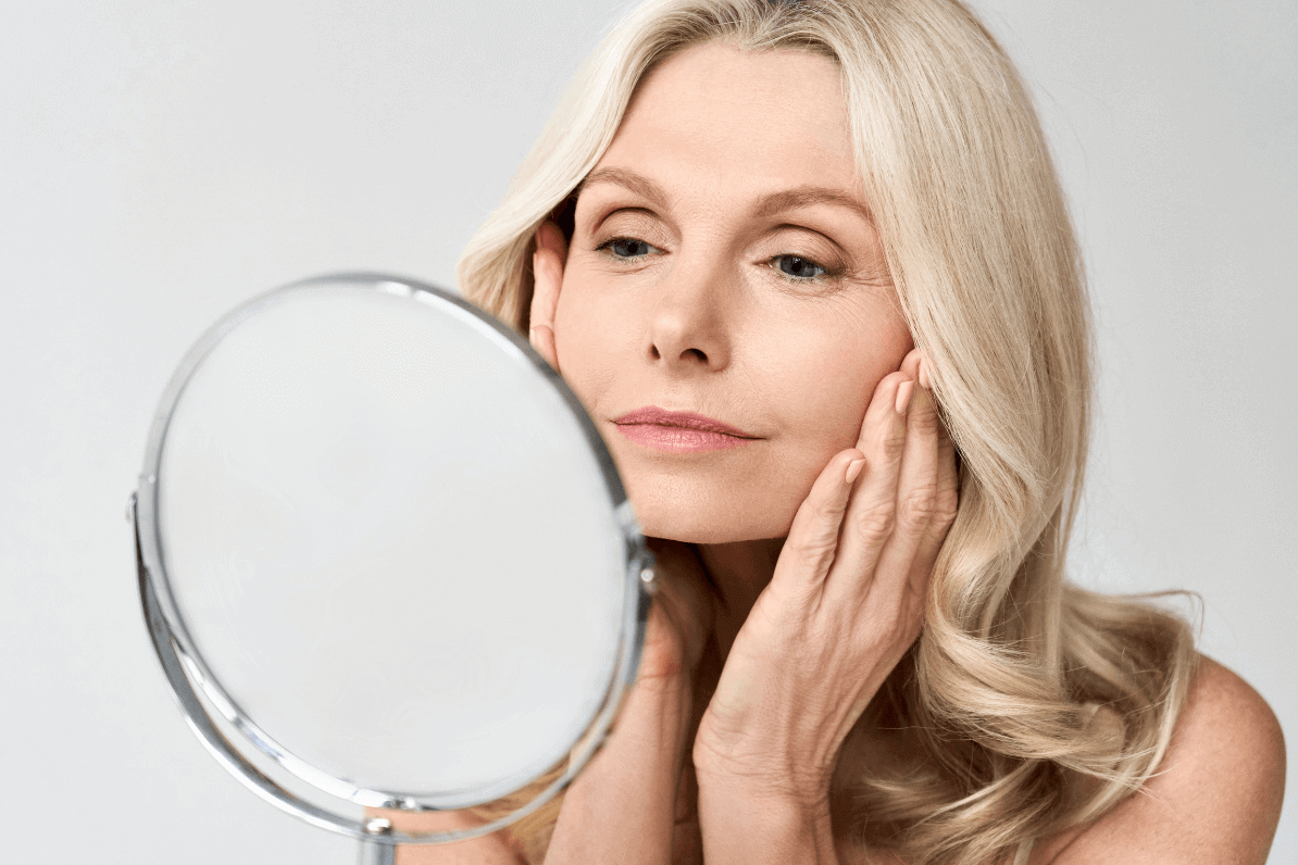 woman looking in the mirror thinking about gettingh Botox (Doncaster)